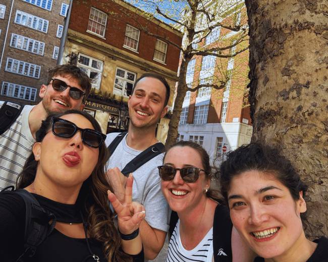 Group of friends taking a selfie on race across the world.